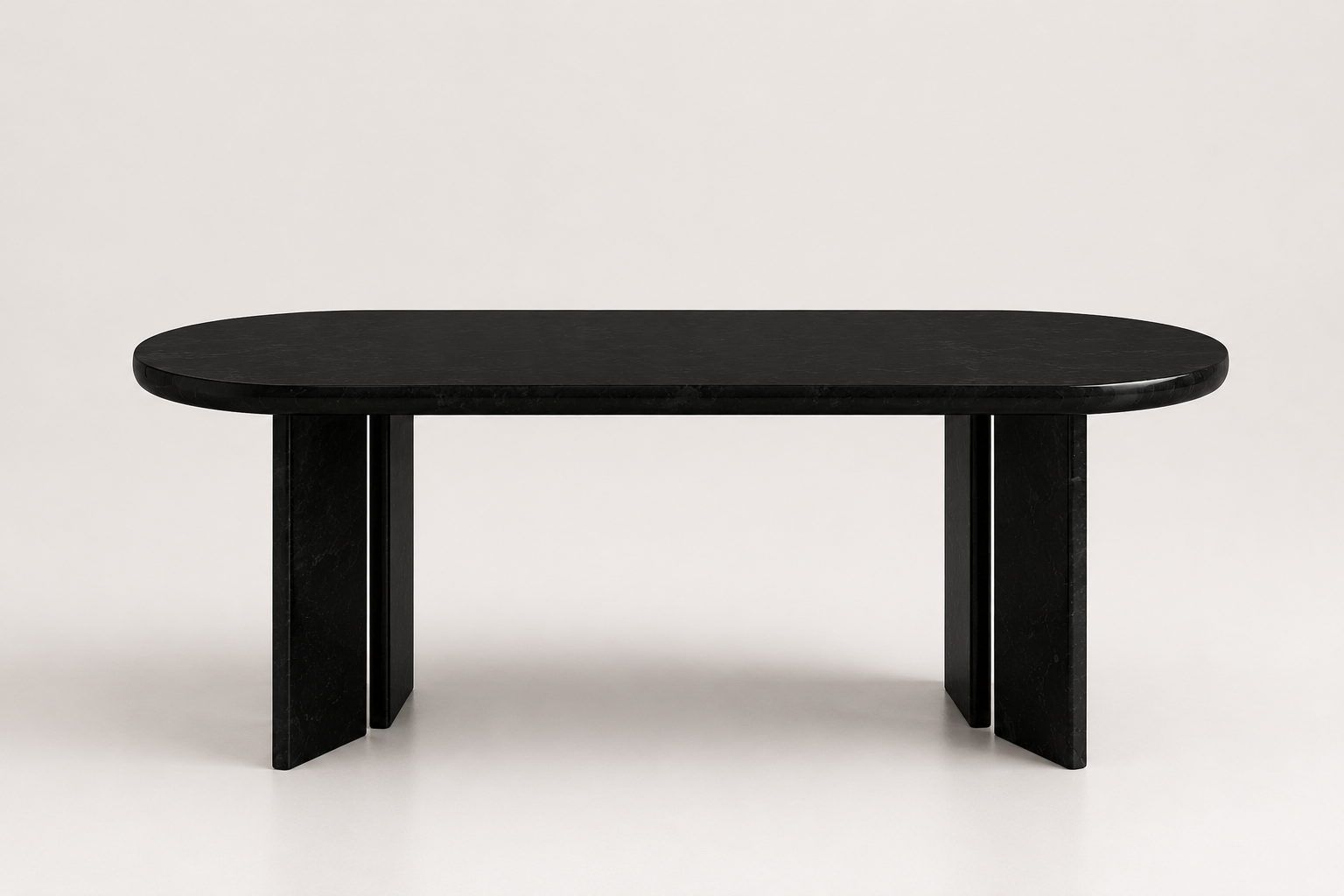 La Table de Repas Oblongue "Monolithe" en Marbre Noir Marquina